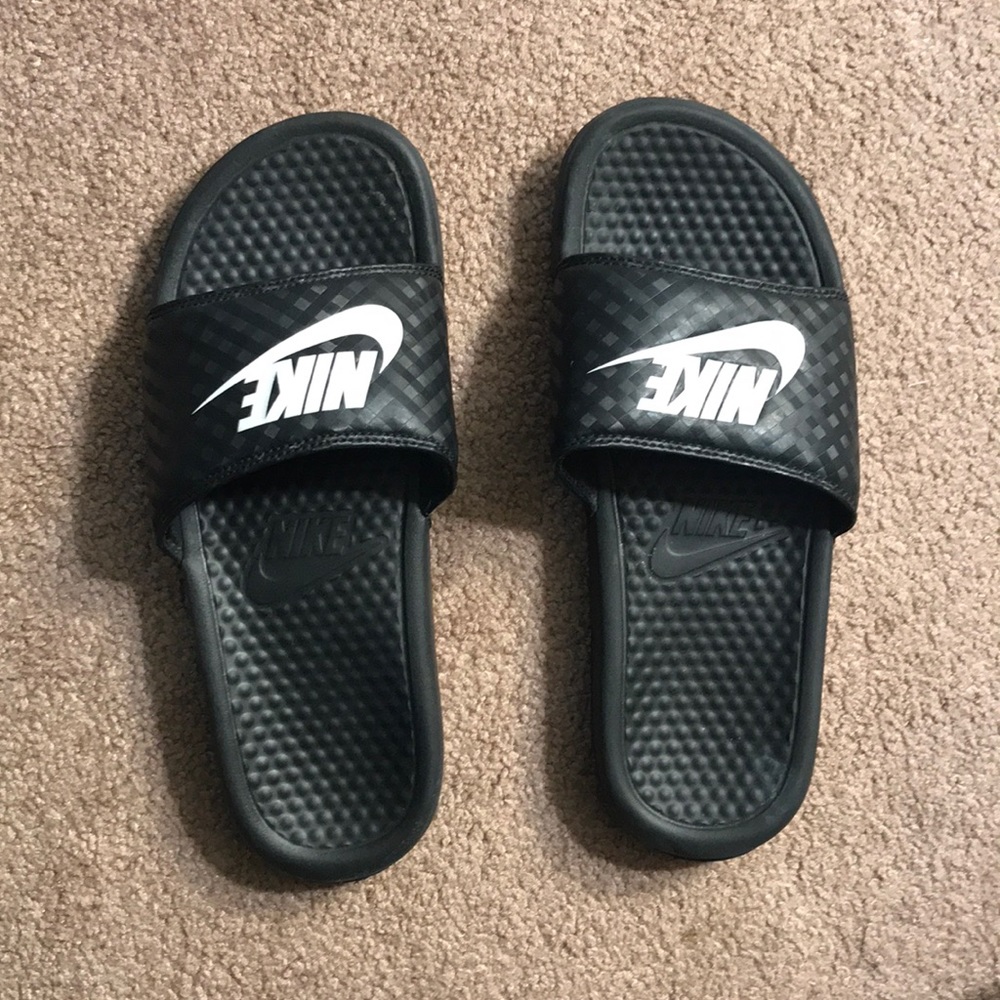 Nike slides.